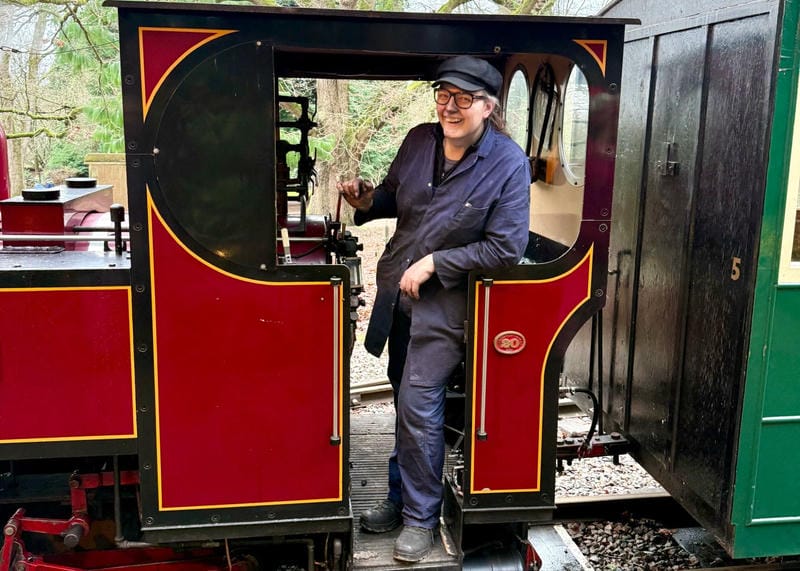 Alex enjoying a turn on Emmett's footplate during the Santa Specials. Photo: John Newman.